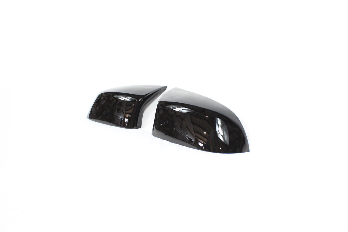 Gloss black mirror replacements for BMW F15 F16 X5 X6 from CT Carbon, showcasing sleek exterior side mirrors.