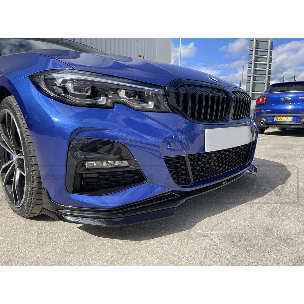 BMW 3 Series G20 G21 Pre LCI gloss black front splitter by CT Carbon, showcasing sleek, aerodynamic design and high-quality finish.