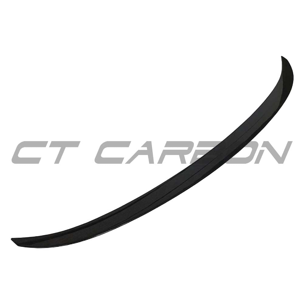 Gloss black spoiler for BMW 3 Series F30 by CT Carbon, showcasing the sleek, aerodynamic MP style design on a black car.