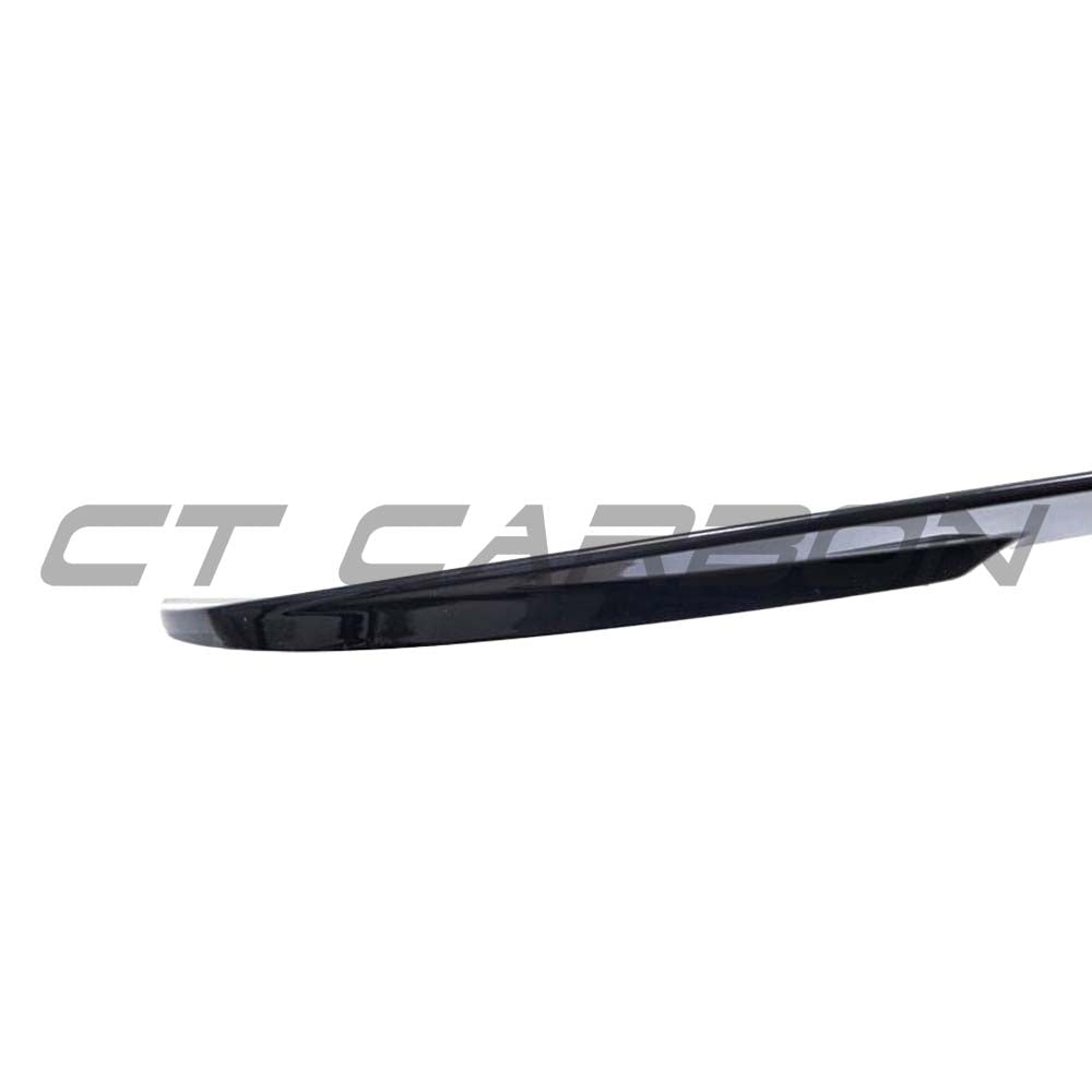 BMW 3 Series F30 gloss black spoiler by CT Carbon, MP style, showcasing the sleek aerodynamic design on a black car.