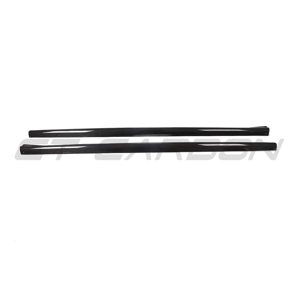 Black BMW G22 4 Series carbon fibre side skirts and diffuser kit by CT Carbon, showcasing sleek, high-performance car accessories.