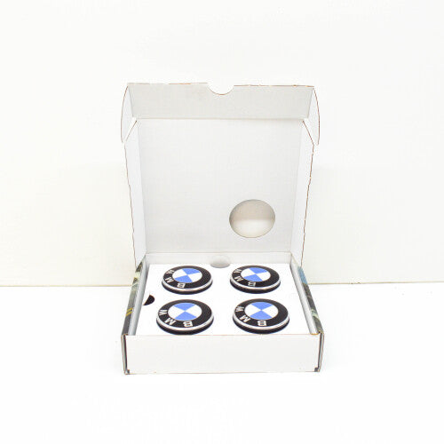 Genuine BMW floating wheel centre hub caps for G30, G20, F48 models, featuring BMW logo and sleek design.