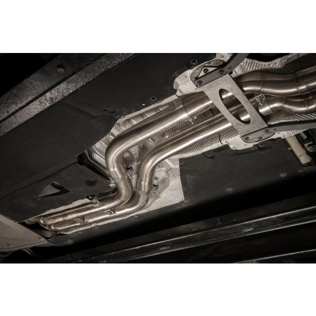 Cobra Sport BMW M4 F82 coupe 3-inch valved primary cat back performance exhaust system showing polished stainless steel pipes