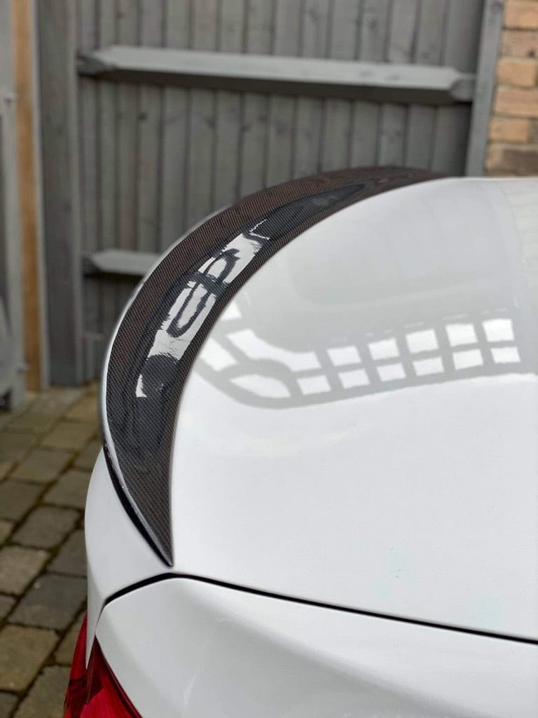 Full BMW F30 3 Series saloon with CT Carbon full carbon fiber kit, showing sporty exterior enhancements and sleek carbon fiber details.