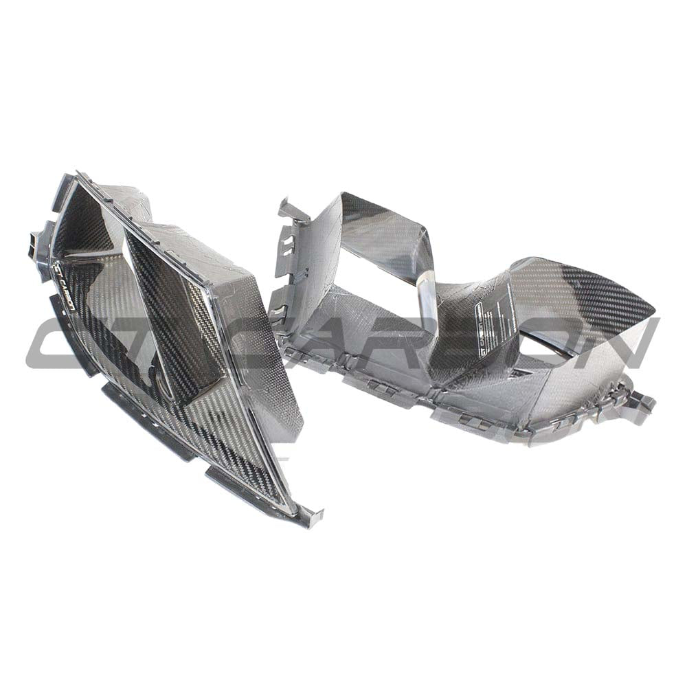 BMW M3 M4 G80 G82 G83 carbon fibre front end kit by CT Carbon, featuring bumper ducts and MP style design.