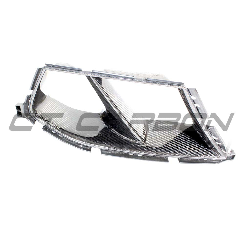 BMW M3/M4 G80/G82 carbon fibre bumper ducts by CT Carbon, showcasing lightweight, aerodynamic accessory for enhanced performance.