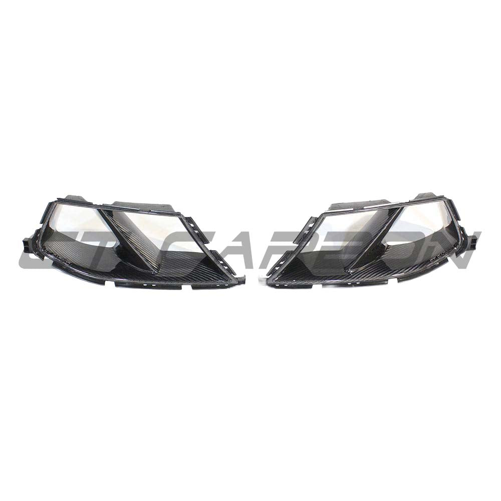 BMW M3 M4 G80 G82 G83 carbon fibre front end kit by CT Carbon, showing bumper ducts and MP style design.