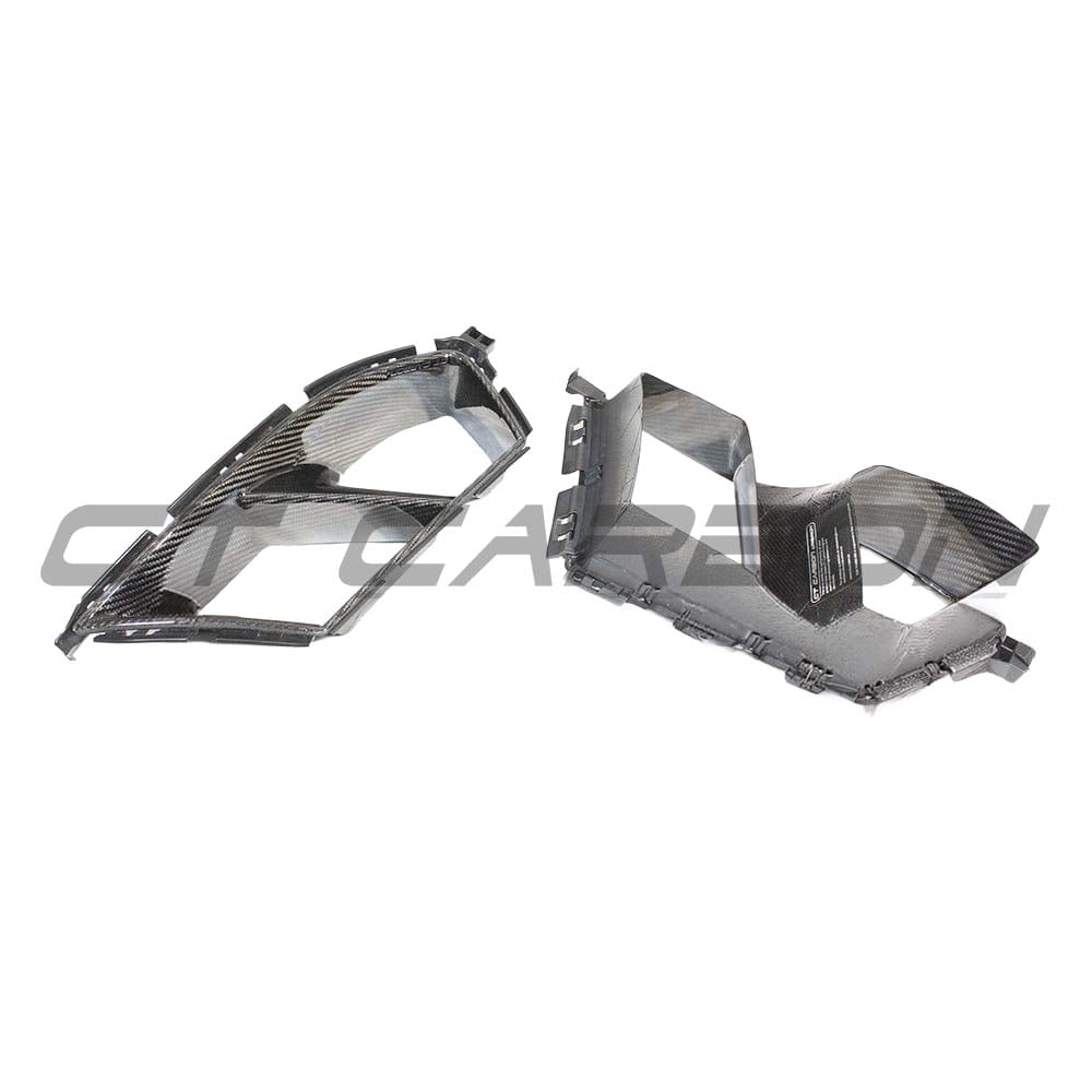 BMW M3 M4 G80 G82 G83 carbon fibre front end pack by CT Carbon, showcasing bumper ducts and MP-style aerodynamic components.