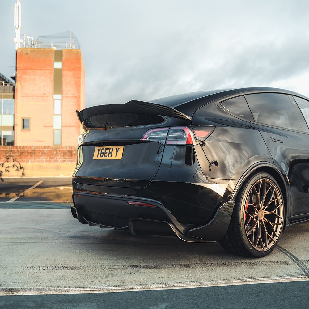 CT Carbon Tesla Model Y MK1 2020-2025 carbon fiber full kit, V3, showing sleek, lightweight carbon fiber components for the vehicle.