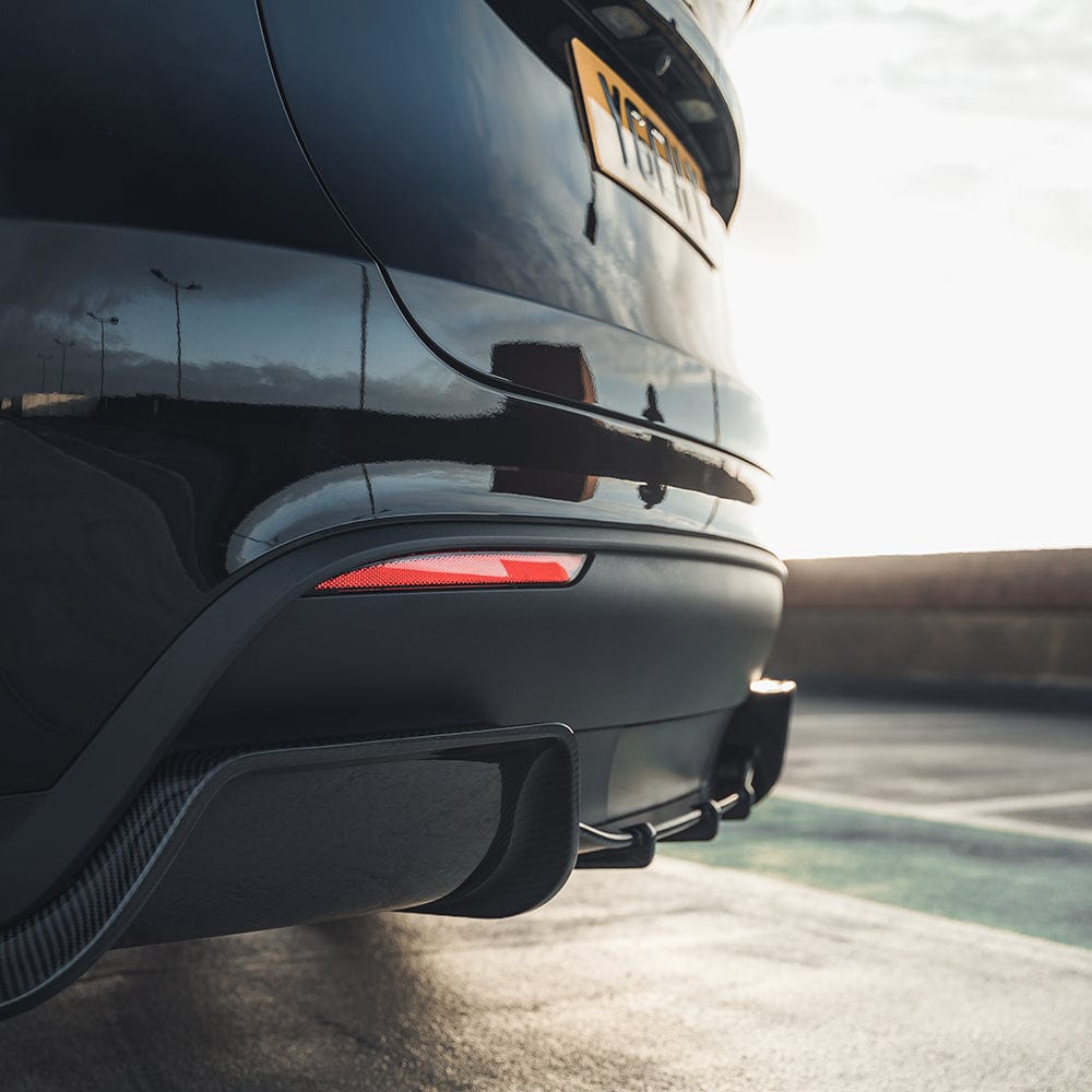 Carbon fiber full kit for Tesla Model Y MK1 2020-2025 by CT Carbon, featuring sleek, textured carbon fiber panels and accessories.