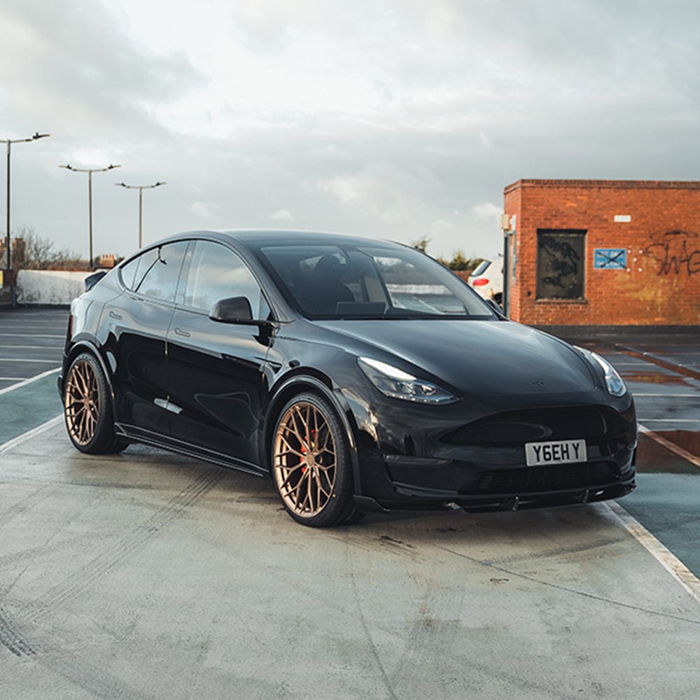 CT Carbon Tesla Model Y MK1 2020-2025 carbon fibre full kit, including front and rear exterior parts, for enhanced style and performance.