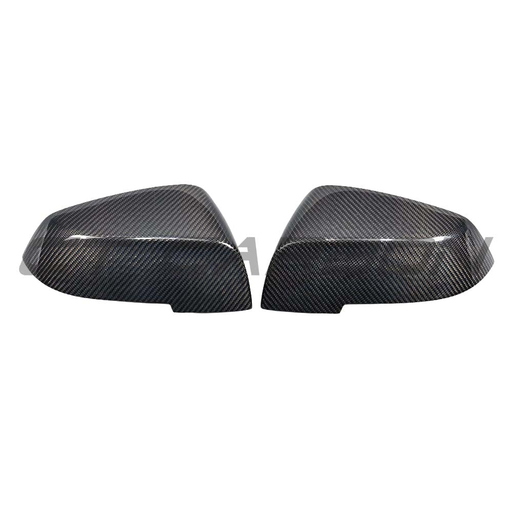 BMW F87 M2 carbon fiber mirror replacement kit by CT Carbon, showcasing sleek OE-style mirror covers on a sporty car.