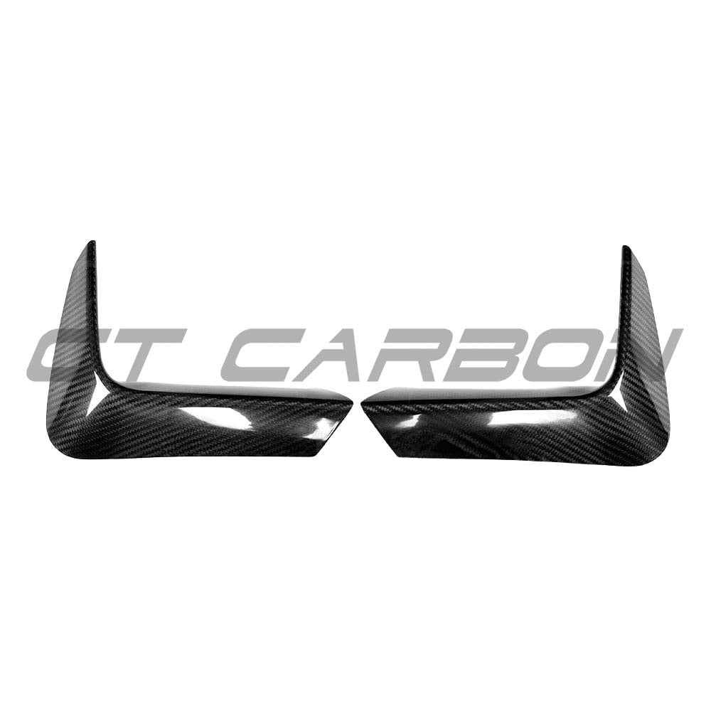 BMW M3 M4 F80 F82 F83 carbon fibre rear bumper canards by CT Carbon installed on the vehicle, enhancing aerodynamics and style.