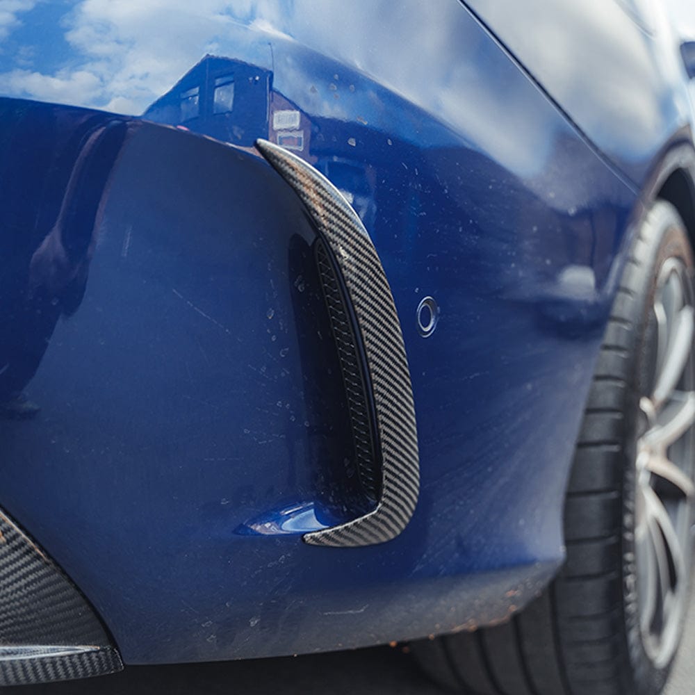 Carbon fiber rear bumper canards for Mercedes W205 C63 and C43 saloon by CT Carbon, enhancing sporty appearance and aerodynamics.