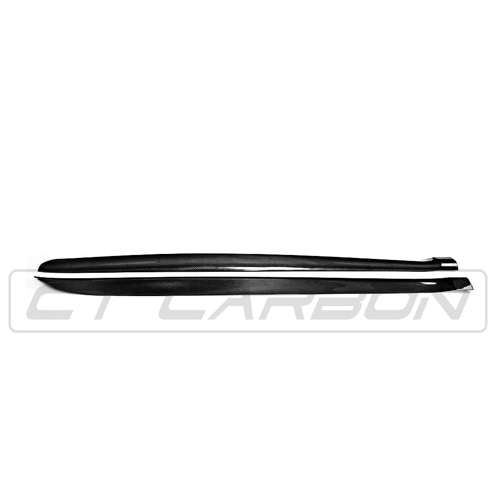 BMW F15 F85 X5 X5M carbon fibre side skirts by CT Carbon, showcasing sleek, textured side skirts installed on the vehicle.