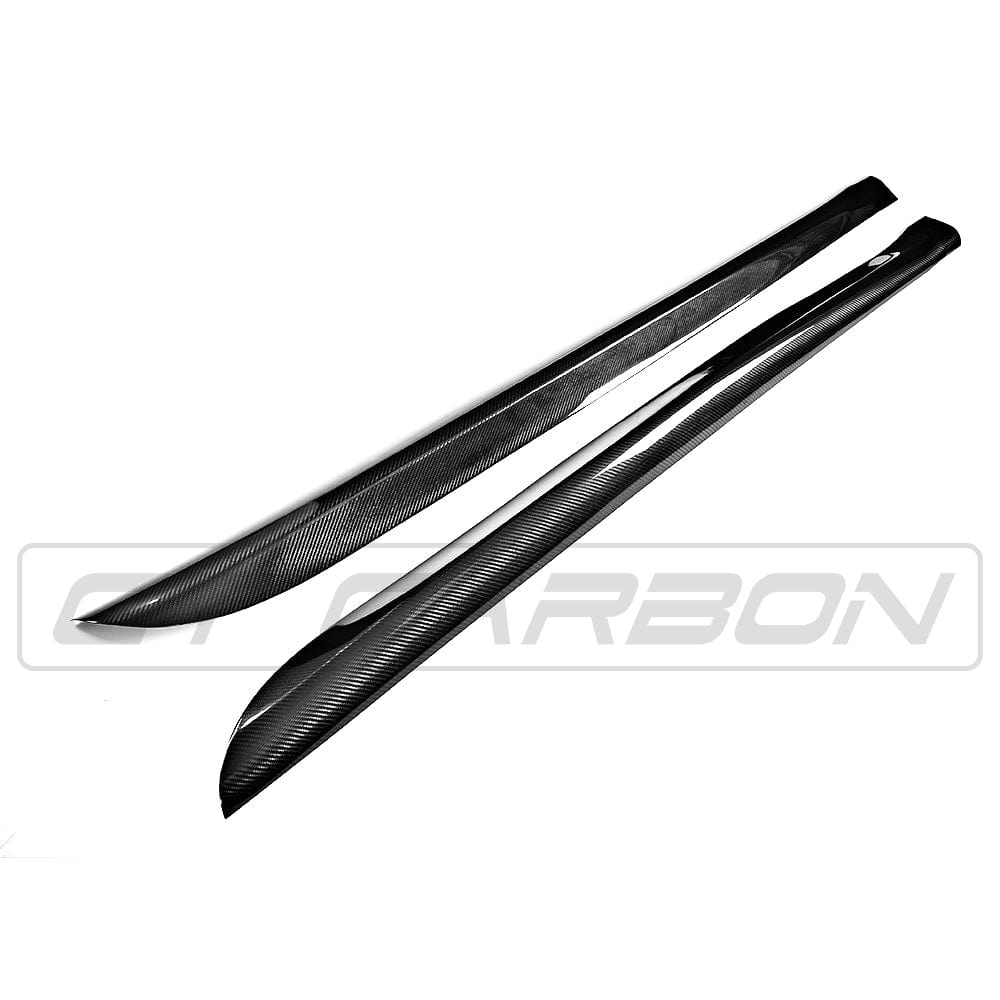 BMW F15/F85 X5 X5M carbon fibre side skirts by CT Carbon, showing sleek, textured side skirts installed on the vehicle.