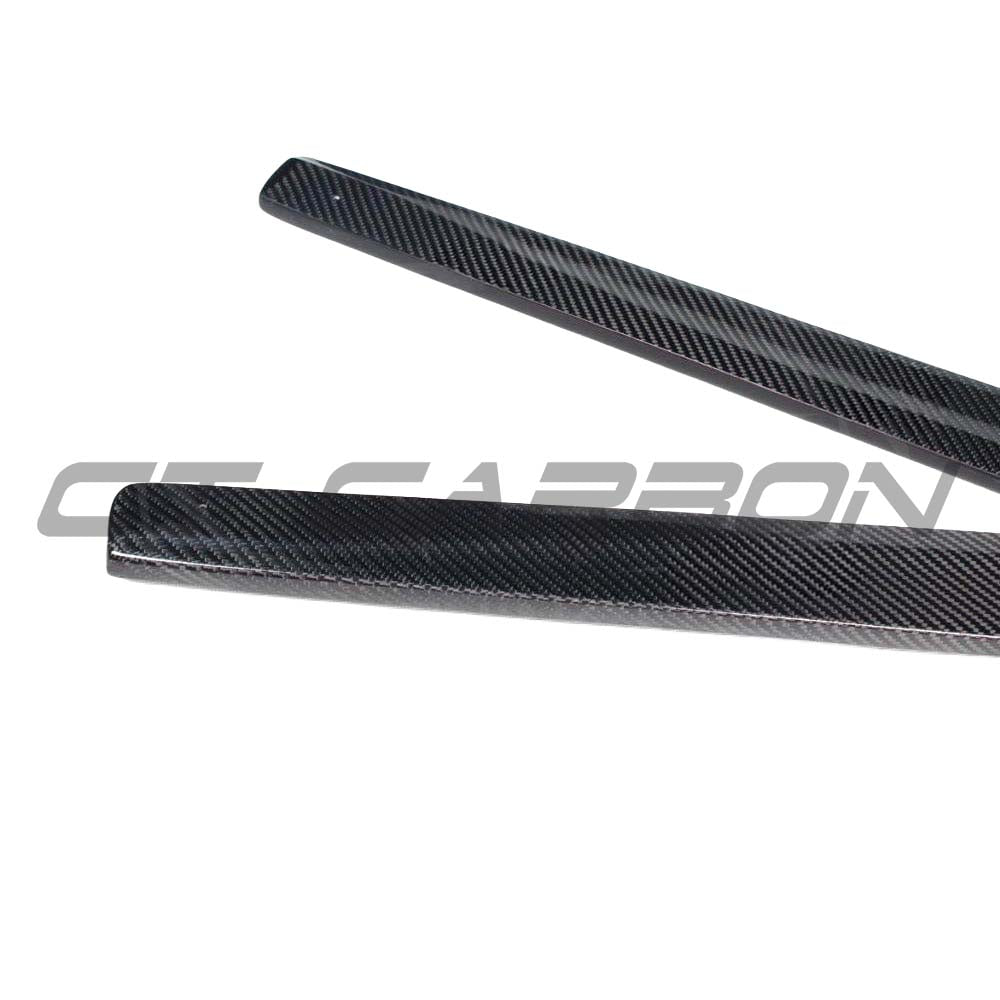BMW F32 and F33 4 Series carbon fibre side skirts by CT Carbon, featuring sleek MP style design for sporty appearance.