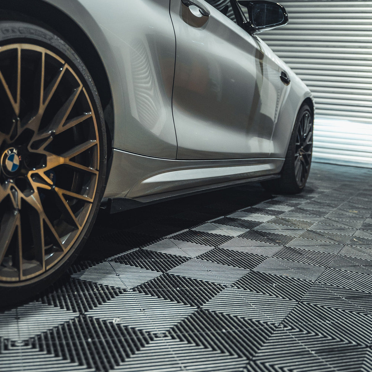 BMW M2 F87 CT Carbon fiber side skirts, V3 design, with a sleek 3D style, enhancing the car's sporty look and aerodynamic profile.