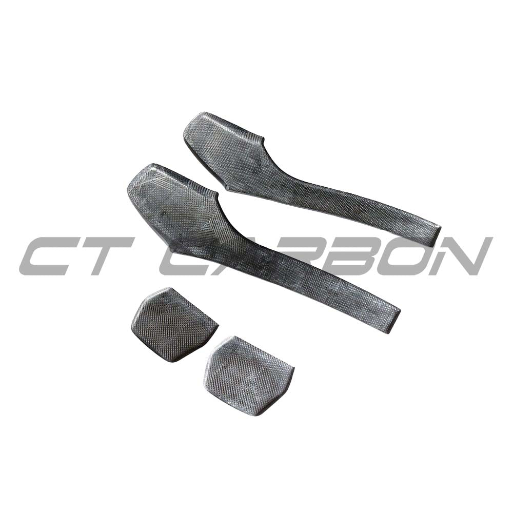 BMW M2C, M3, M4 carbon fibre seat back accessory by CT Carbon, close-up view showing textured carbon fiber surface.
