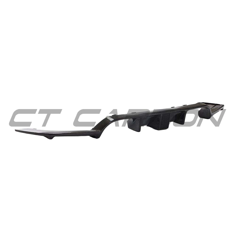 BMW M3 M4 F80 F82 F83 carbon fibre diffuser with DTM light by CT Carbon, showing full carbon fibre construction and aerodynamic design.