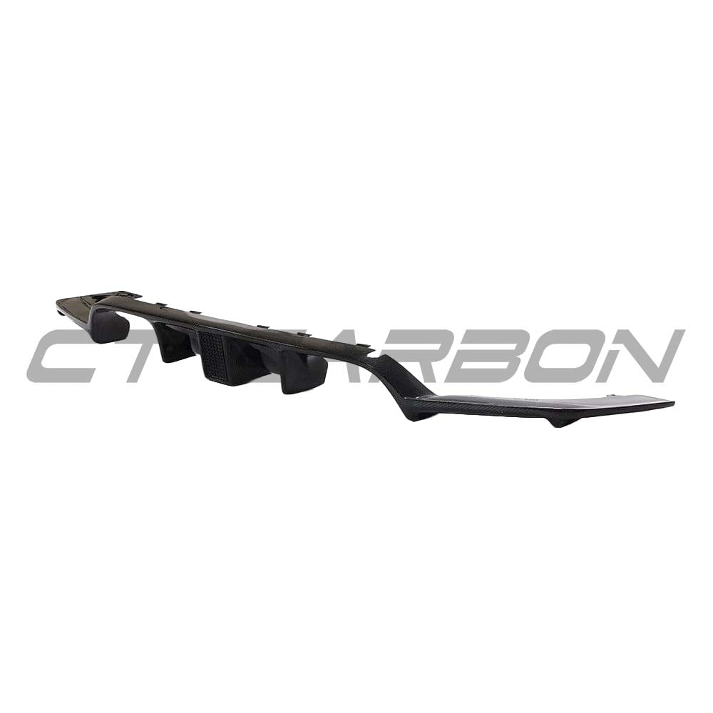 Full-carbon fiber BMW M3/M4 F80/F82/F83 diffuser with DTM light by CT Carbon, showcasing sleek aerodynamic design.