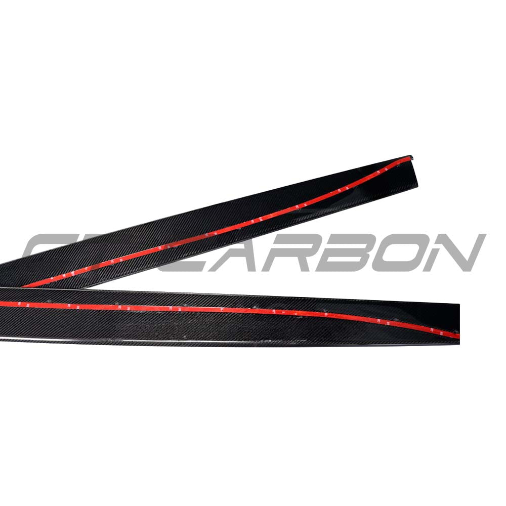 BMW M3 M4 F80 F82 F83 carbon fiber side skirts by CT Carbon, showing full V-style design on a sleek sports car.