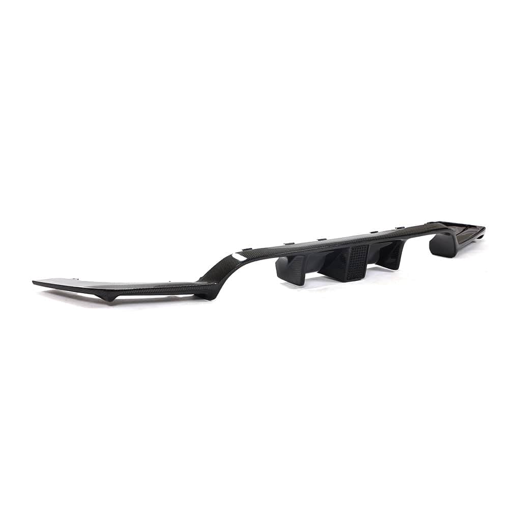 BMW M3 M4 F80 F82 F83 carbon fibre diffuser with DTM light by CT Carbon, showcasing aerodynamic design and lightweight construction.