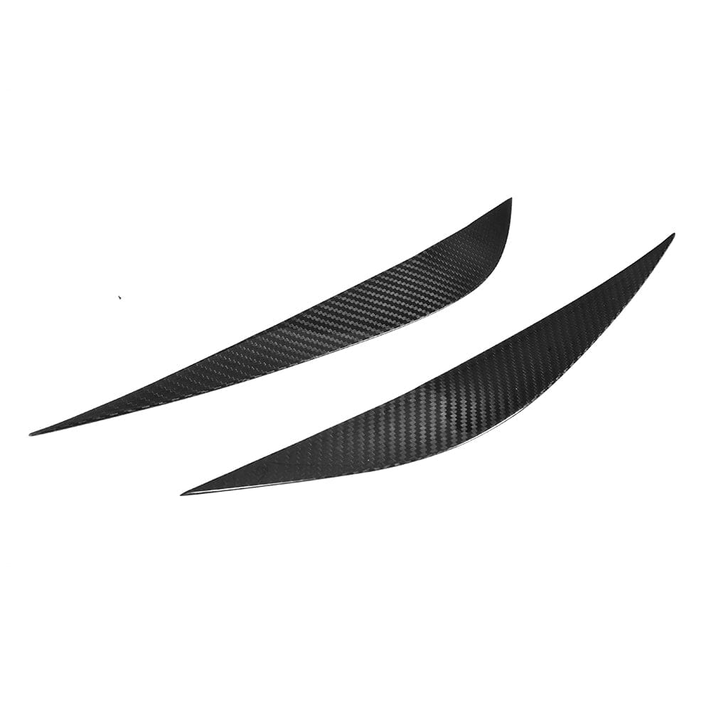 BMW M3 M4 F80 F82 F83 carbon fibre eye lids accessory by CT Carbon, showing sleek, lightweight carbon fibre eye lid design.