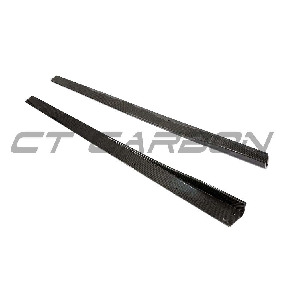 BMW M3 M4 F80 F82 F83 carbon fiber side skirts by CT Carbon, showcasing sleek 3D-style side skirt design on a sporty car.