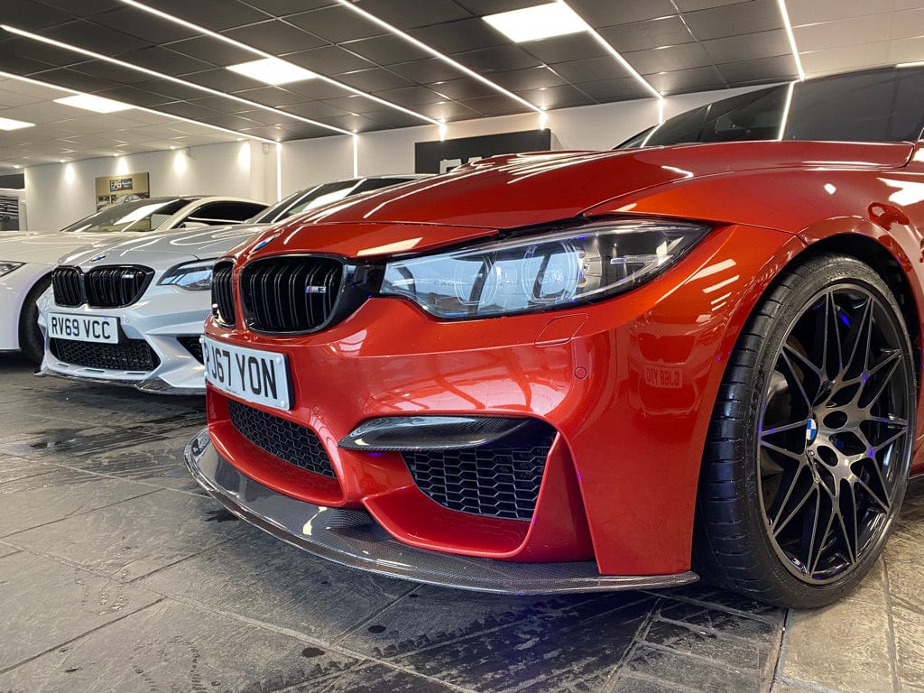 BMW M3 M4 F80 F82 F83 carbon fibre splitter by CT Carbon, featuring aerodynamic design and lightweight construction.