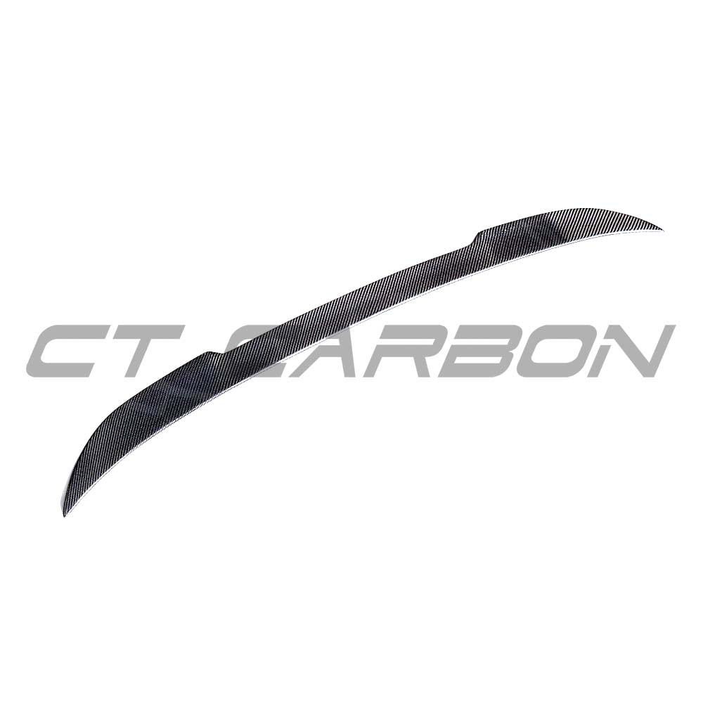 BMW M5 F90 and G30 5 Series carbon fiber spoiler by CT Carbon, showcasing a sleek, aerodynamic design with a split-style finish.