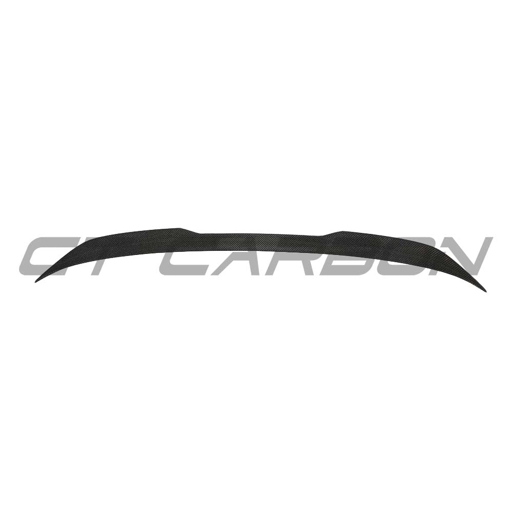 BMW G30 5 Series carbon fibre kit by CT Carbon, including splitters and spoiler, showcasing sleek V8 aero enhancements.