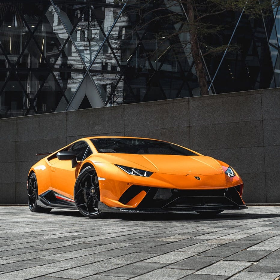 Carbon fiber Lamborghini Huracan Performante forged splitter by CT Carbon, shows aerodynamic splitter on sports car.