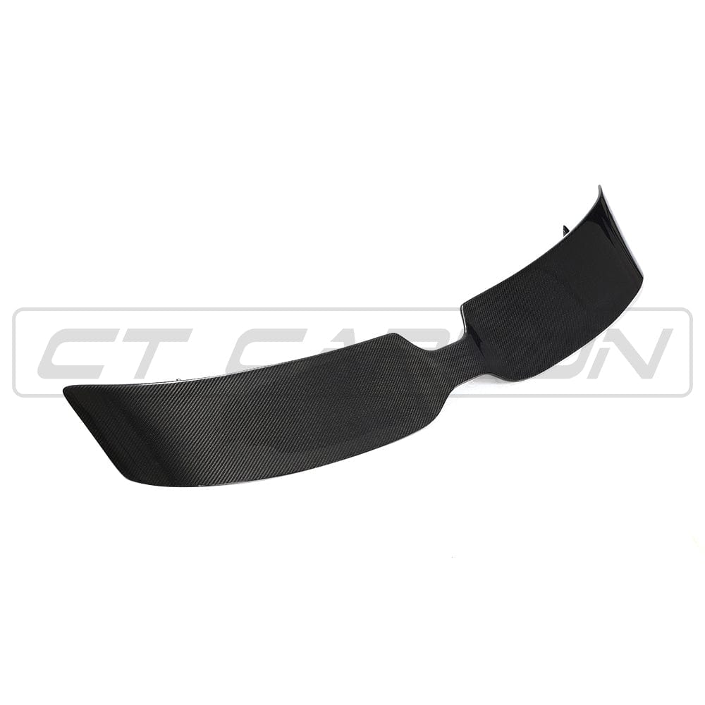 Carbon fiber spoiler for Mini Cooper S F56/JCW Sport Pack by CT Carbon, showing sleek aerodynamic design on the vehicle.