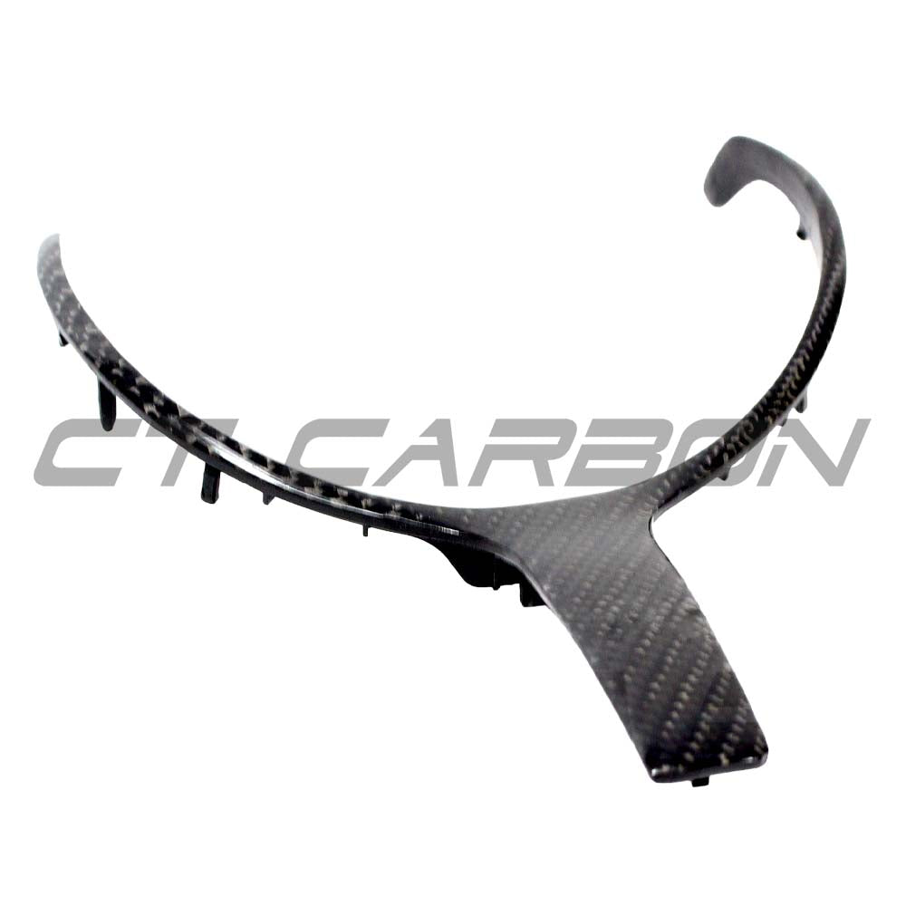 BMW M Sport Fxx carbon fiber steering wheel trim by CT Carbon, showcasing sleek black carbon fiber with subtle branding details.