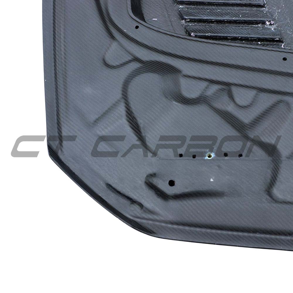 BMW M2/M2C F87 and 1 Series F20/F22 carbon fiber bonnet by CT Carbon, showing sleek lightweight car hood with textured finish.