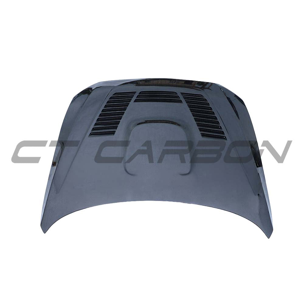 BMW F87 M2 carbon fibre full car kit with bonnet, showcasing lightweight, high-performance carbon fibre components by CT Carbon.