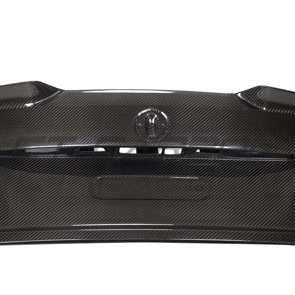 BMW M2 F87 M2C F22 carbon fibre bootlid by CT Carbon, showcasing lightweight, aerodynamic design on a sporty car.