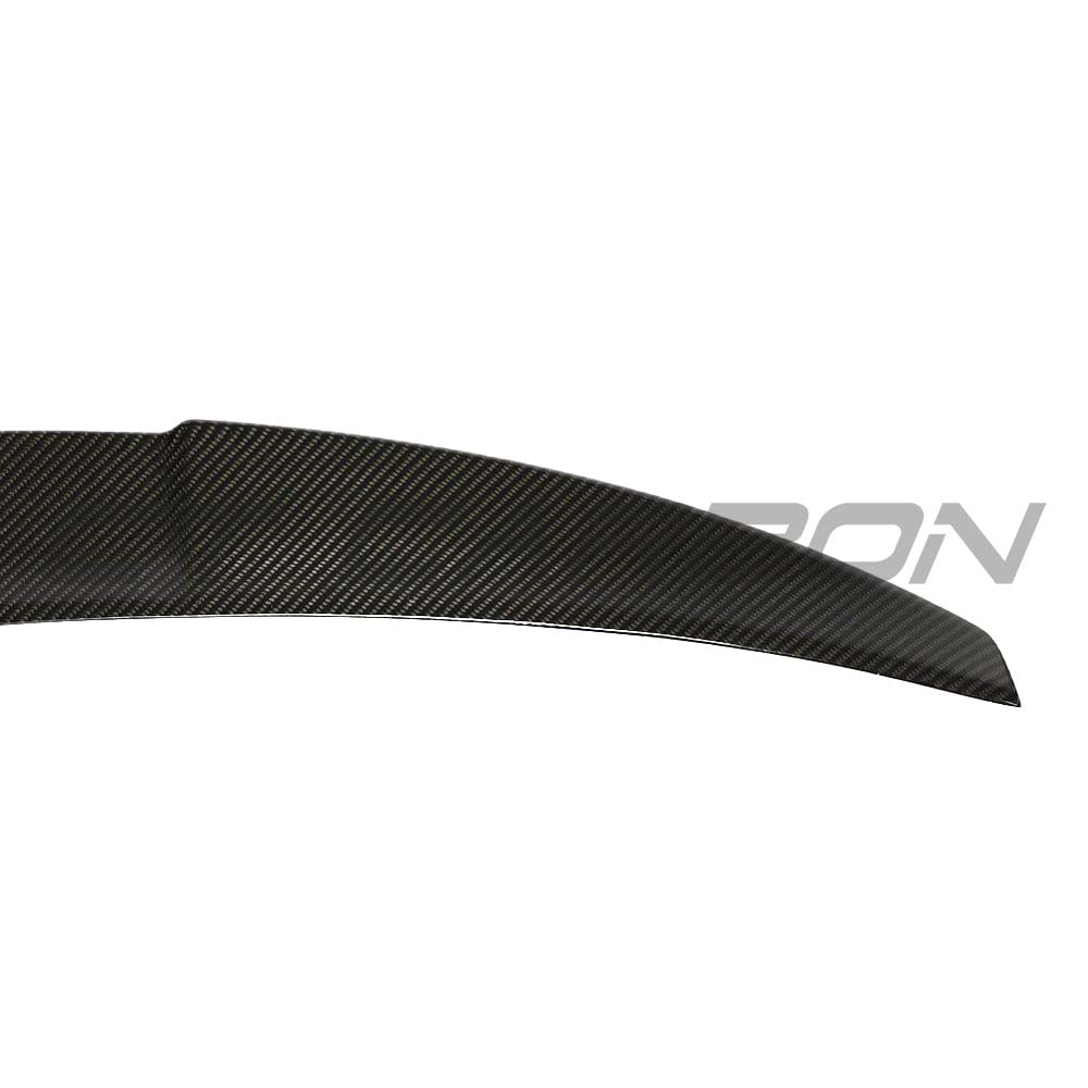 BMW M2 F87 and F22 carbon fiber spoiler by CT Carbon, showcasing sleek V6 design on a sporty car.