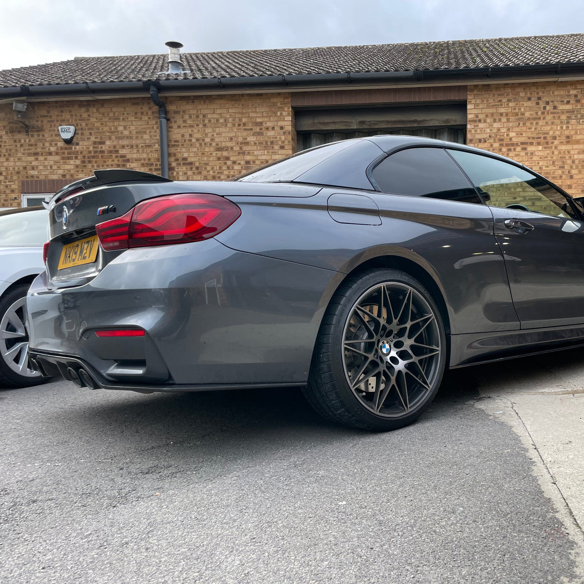 BMW M4 F83 & F33 4 Series carbon fibre spoiler by CT Carbon, showcasing sleek, lightweight performance-enhancing design.