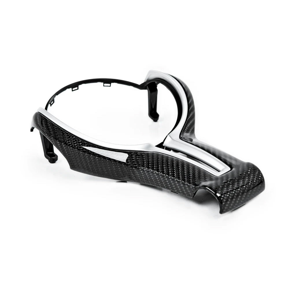 BMW Fxx M series carbon fibre steering wheel trim accessory by CT Carbon, showcasing sleek, textured carbon fibre detail.
