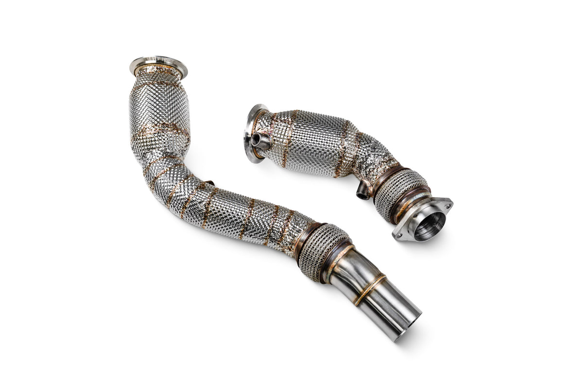 Scorpion BMW M3 F80, M4 F82 F83 sports cat downpipe with high flow catalyst, showing the sleek metallic pipe and catalytic component.
