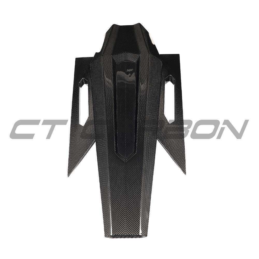 CT Carbon Lamborghini Revuetlo roof scoop and carbon fibre engine cover installed on a sports car, showcasing sleek racing design.