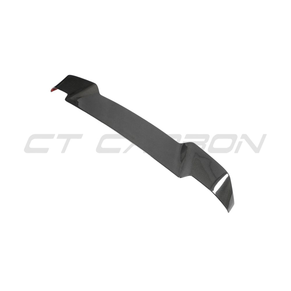 Carbon fibre spoiler for Land Rover Defender L663 90/110/130 by CT Carbon, shown on vehicle with sleek design details
