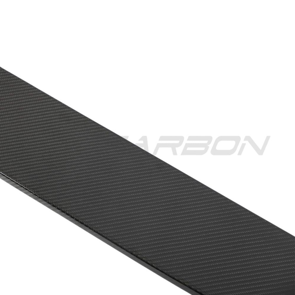 Carbon fiber spoiler for Land Rover Defender L663 90/110/130 by CT Carbon, showing the sleek, aerodynamic design on the vehicle.