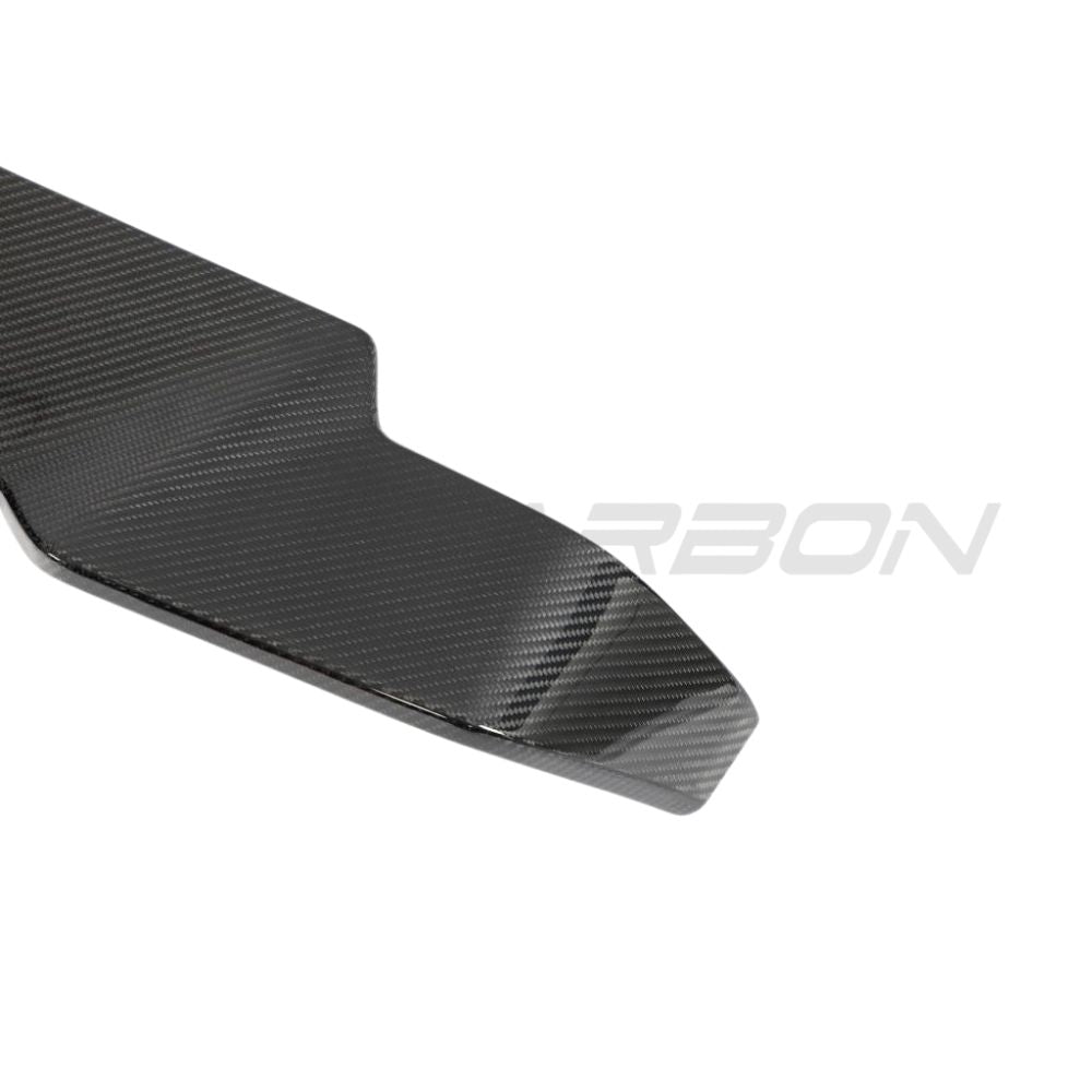 CT Carbon Land Rover Defender L663 carbon fibre spoiler mounted on the vehicle, featuring a sleek aerodynamic design.