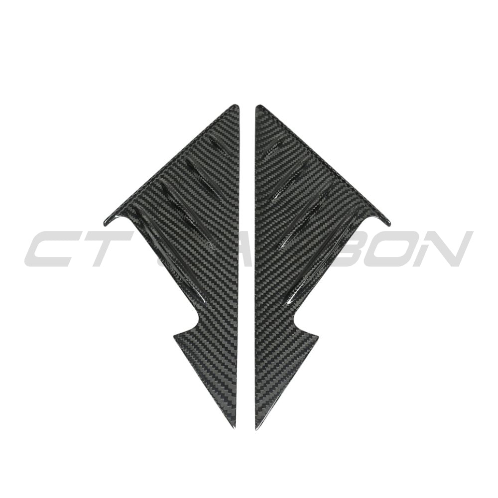 BMW M3 G80, 3 Series G20 Carbon Fibre Mirror Pillar Trim by CT Carbon, close-up of sleek black carbon fiber accents on car mirror pillars.