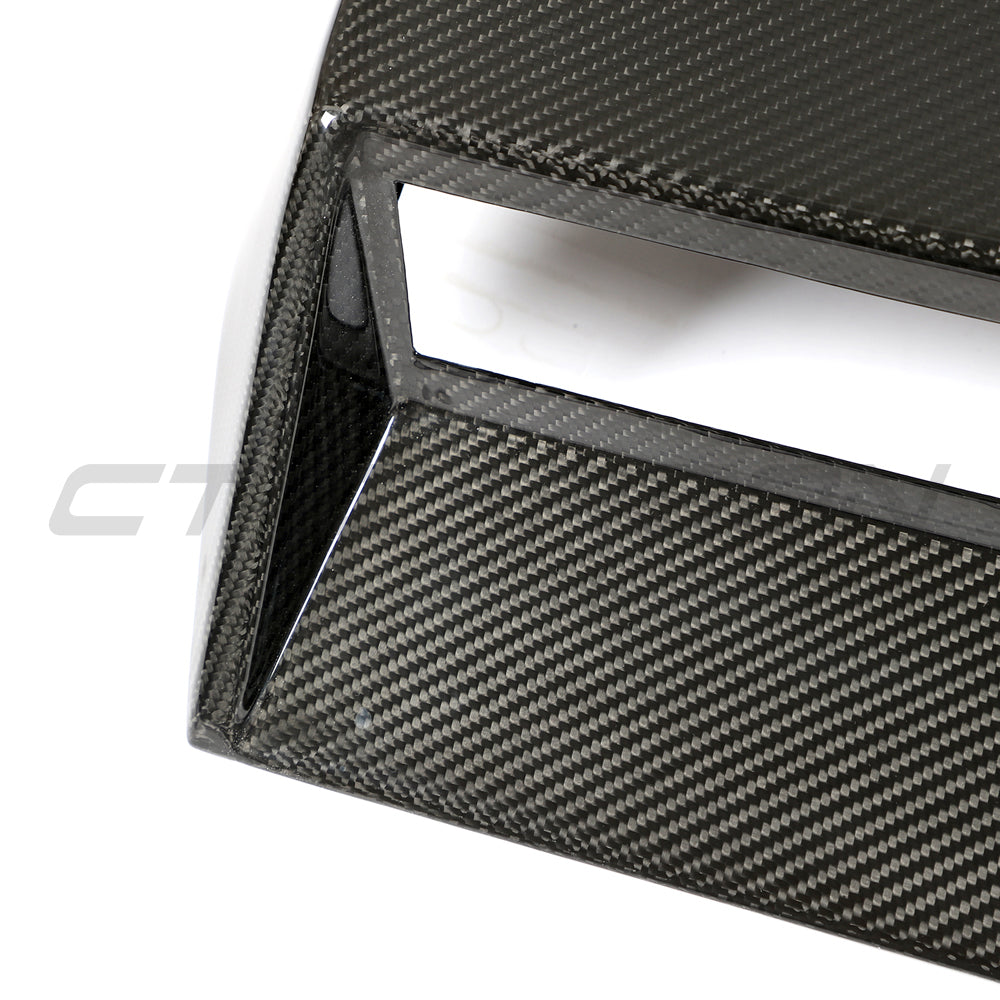Carbon fibre roof scoop accessory for McLaren 570S and 570GT by CT Carbon, shown on the car's roof.