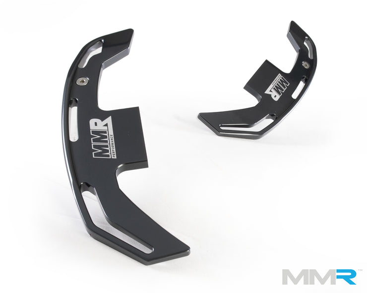 Gray magnetic gear shift paddles for BMW M3 E92 steering wheel by MMX Performance, designed for easy hand operation.