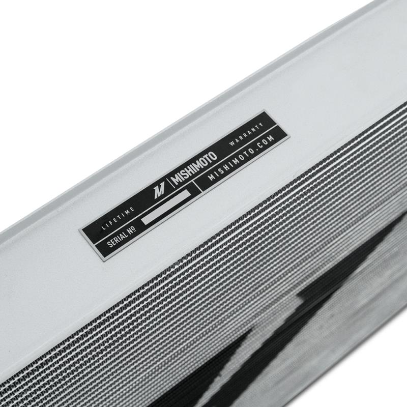 MISHIMOTO performance aluminum radiator for Volkswagen MK7 Golf TSI/GTI 2015+, showcasing the sleek, lightweight design with cooling fins.